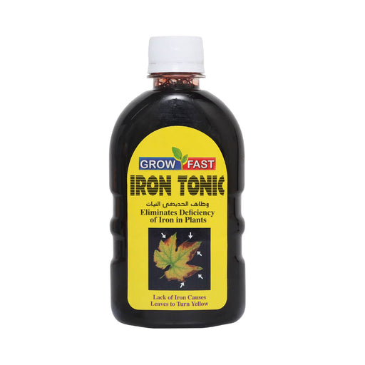 Bottle of Iron Tonic with a yellow label on a white background