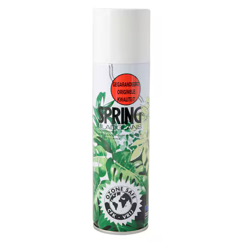 Spray can with green leaf design and 'Spring' branding on a white background