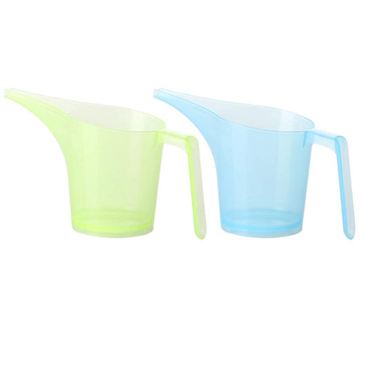 Two plastic measuring cups, one green and one blue, on a white background.