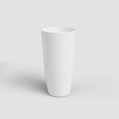 White ceramic vase on a light gray background