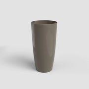 Brown cylindrical vase on a light gray background