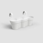 White freestanding bathtub with wavy design on a light gray background