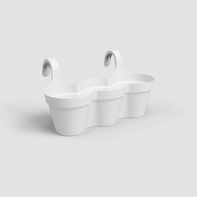 White freestanding bathtub with wavy design on a light gray background