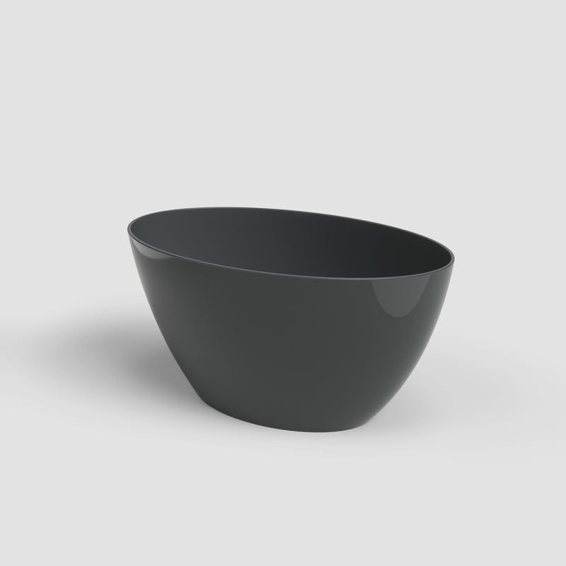Black ceramic bowl on a light gray background