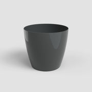 Black cylindrical pot on a white background