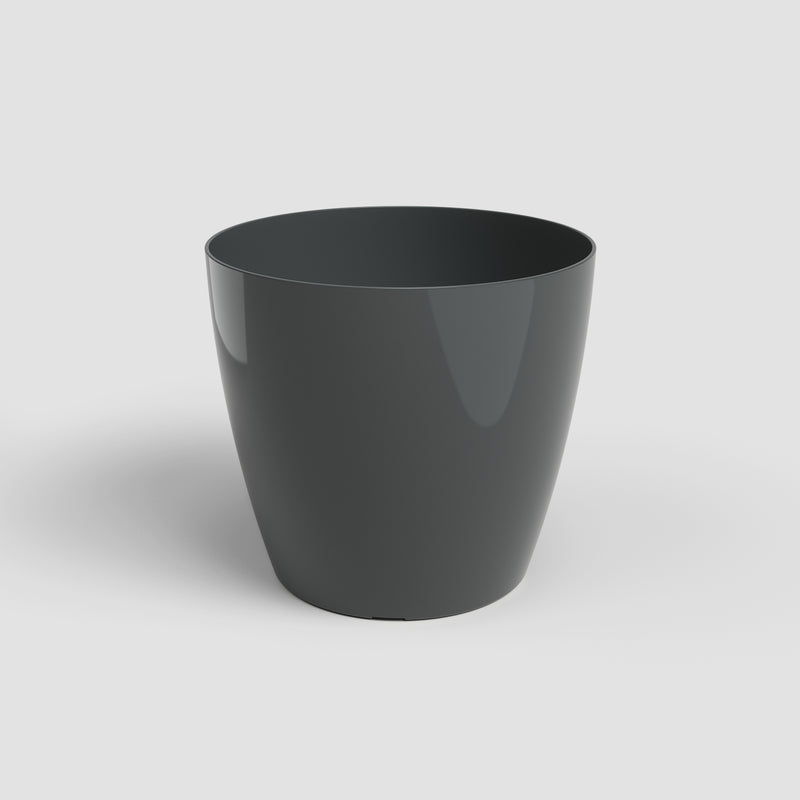 Black cylindrical pot on a white background