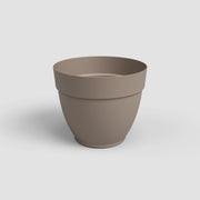 Beige pot on a light gray background