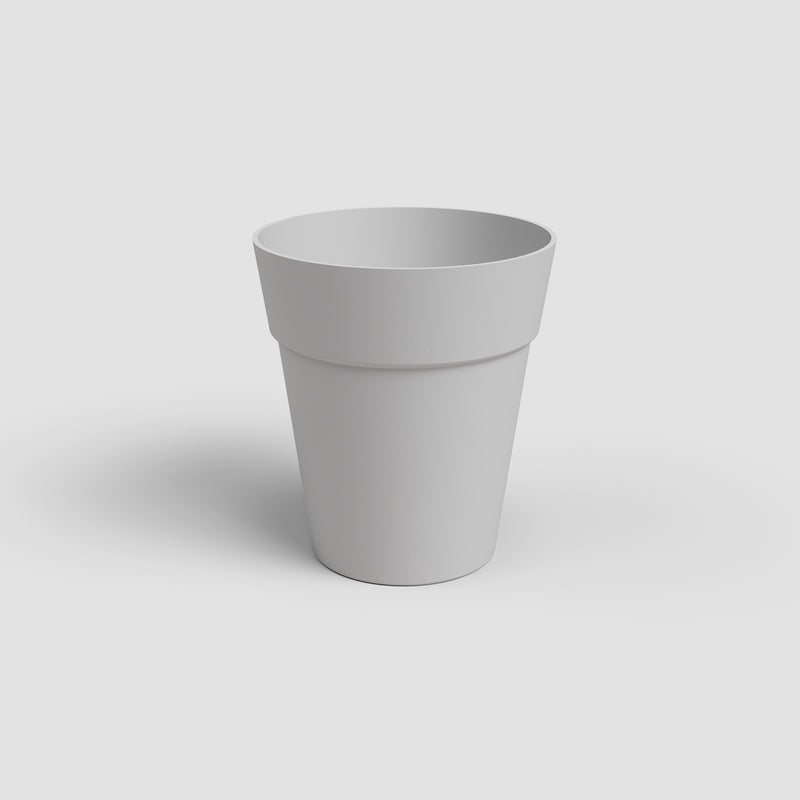 White flower pot on a light gray background