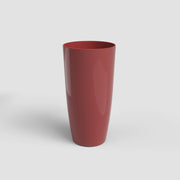 Red vase on a light gray background