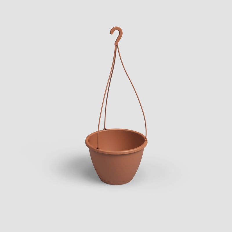 Brown hanging plant pot on a light gray background