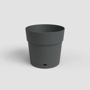 Dark gray cylindrical pot on a light gray background