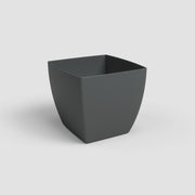 Dark gray square planter on a light gray background