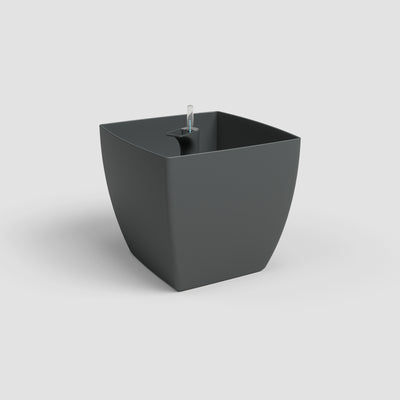 Black freestanding bathtub on a light gray background