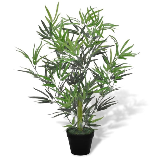 Artificial potted plant with green leaves on a white background