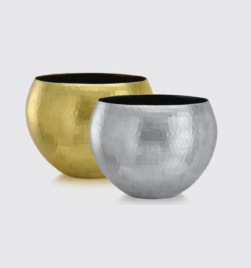 Two metallic planters, one gold and one silver, on a light gray background