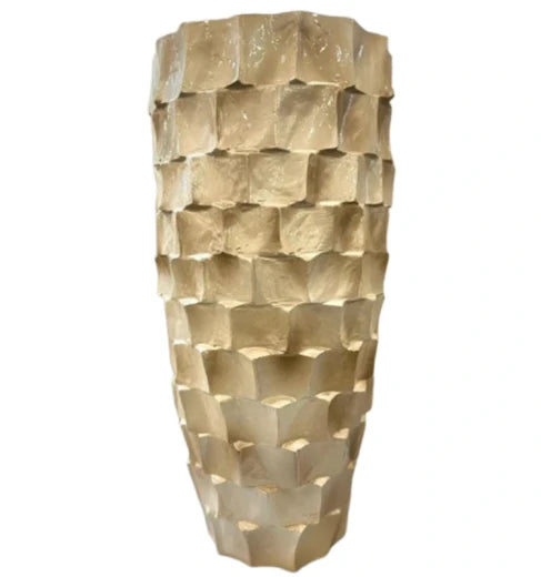 Decorative gold vase with a textured, geometric pattern on a white background
