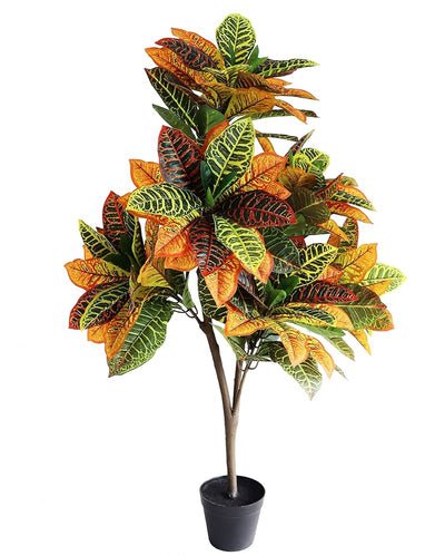 Artificial potted plant with multicolored leaves on a white background