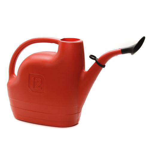 Red watering can with a black spout on a white background