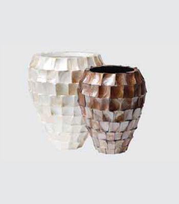 Two decorative vases with mosaic patterns on a light gray background